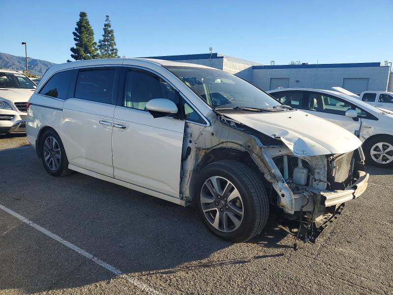 Photo 4 from auction – 2014 HONDA ODYSSEY TO with VIN 5FNRL5H96EB124975