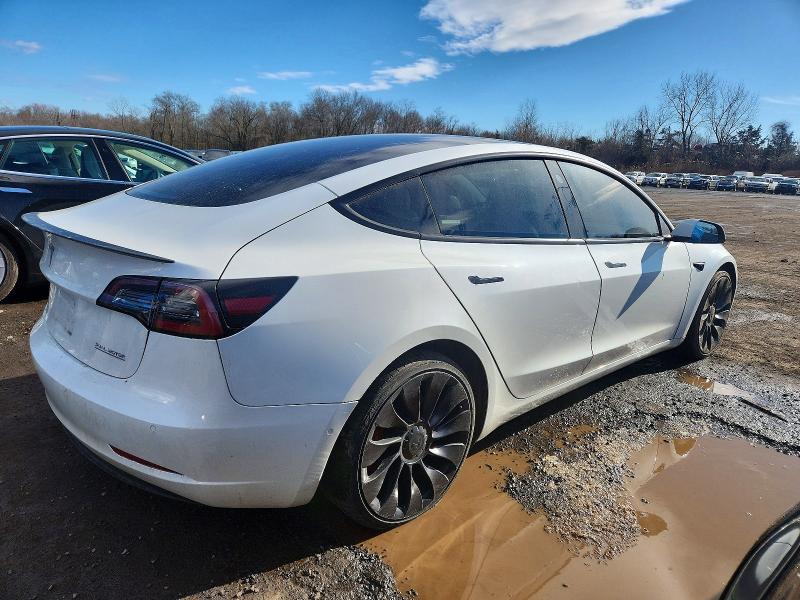 Photo 3 from auction – 2022 TESLA MODEL 3 with VIN 5YJ3E1EC6NF192833