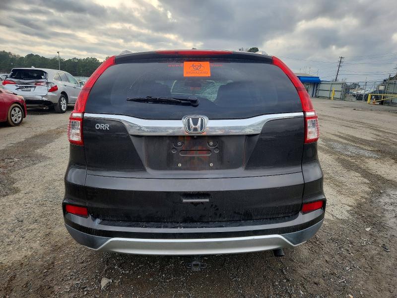 Photo 6 from auction – 2015 HONDA CR-V with VIN 2HKRM3H79FH538920
