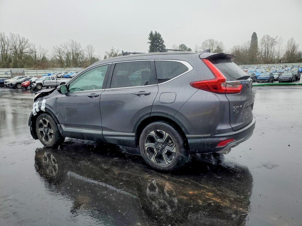 Photo 2 from auction – 2018 HONDA CR-V TOURI with VIN 2HKRW2H94JH633433