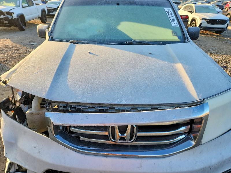 Photo 11 from auction – 2012 HONDA PILOT LX with VIN 5FNYF4H20CB003811