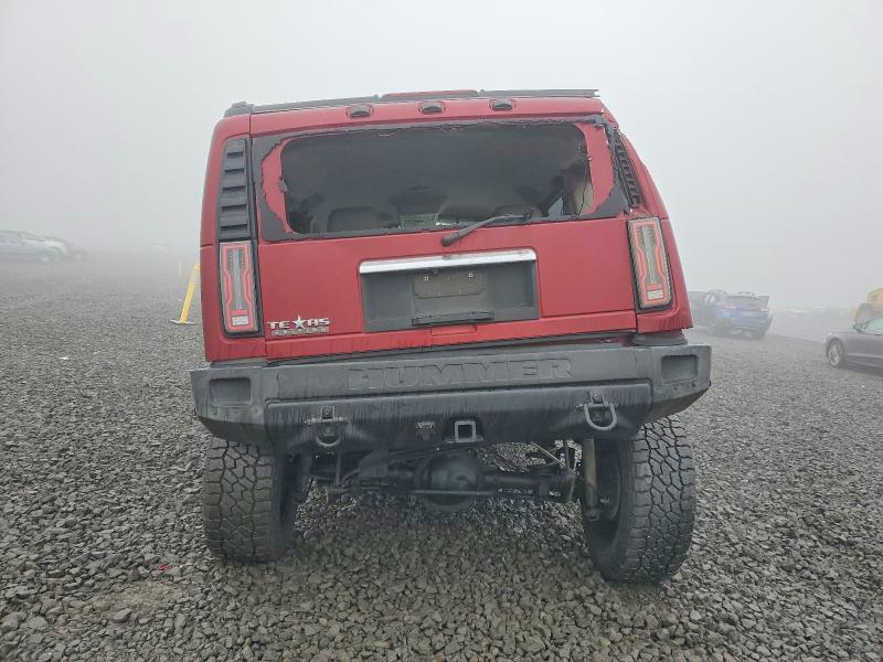 Photo 6 from auction – 2003 HUMMER H2 with VIN 5GRGN23U23H129565