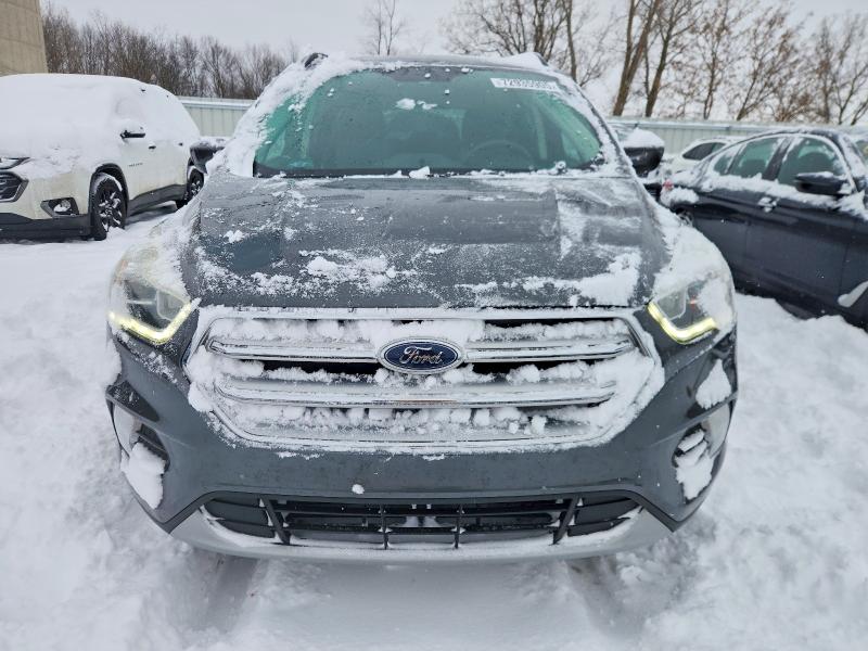 Photo 5 from auction – 2017 FORD ESCAPE with VIN 1FMCU9GD6HUA68317