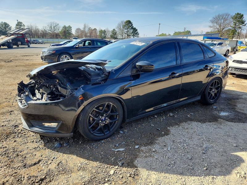 FORD FOCUS 2016 with VIN 1FADP3F29GL393065 - Photo from auction