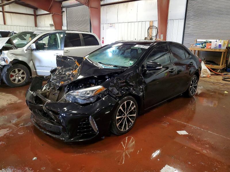 TOYOTA COROLLA 2017 with VIN 5YFBURHE4HP659363 - Photo from auction