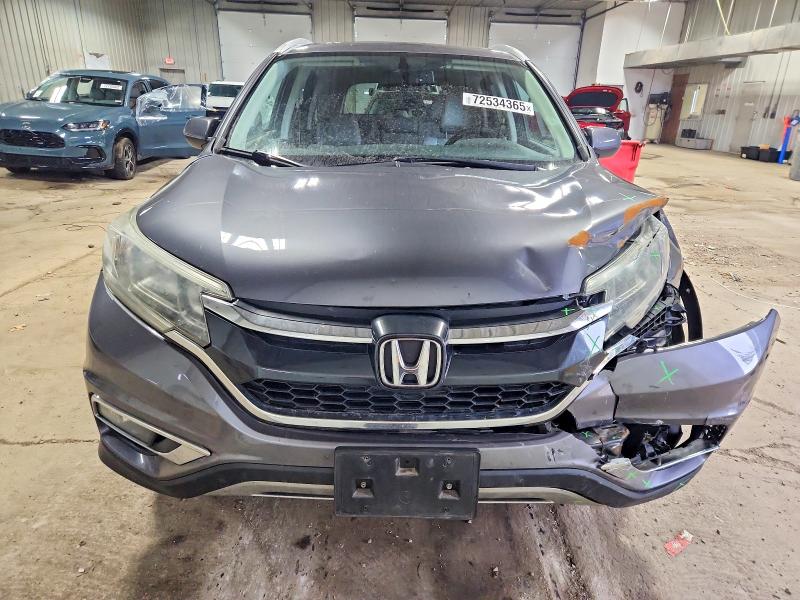 Photo 5 from auction – 2015 HONDA CR-V EXL with VIN 2HKRM4H71FH695458