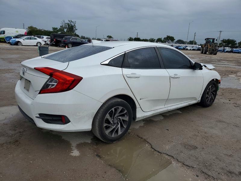 Photo 3 from auction – 2018 HONDA CIVIC EX with VIN 19XFC2F7XJE002803