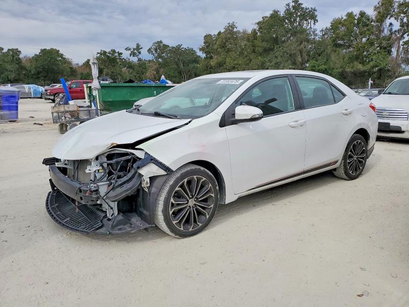 TOYOTA COROLLA L 2015 with VIN 2T1BURHE0FC303702 - Photo from auction