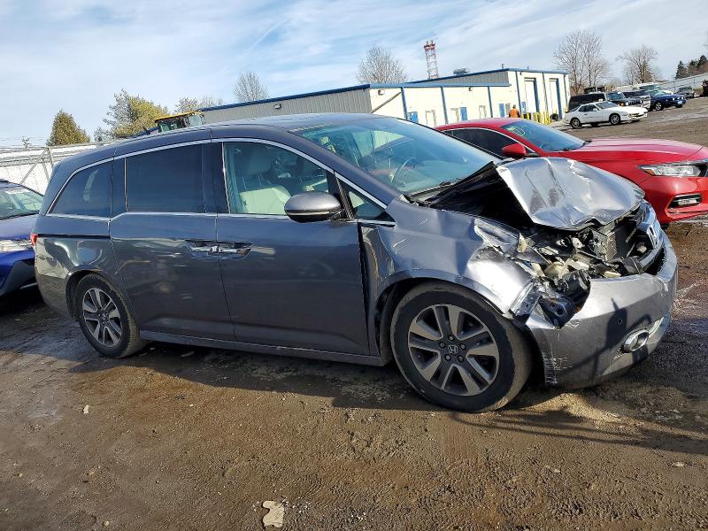 Photo 4 from auction – 2016 HONDA ODYSSEY with VIN 5FNRL5H97GB101739