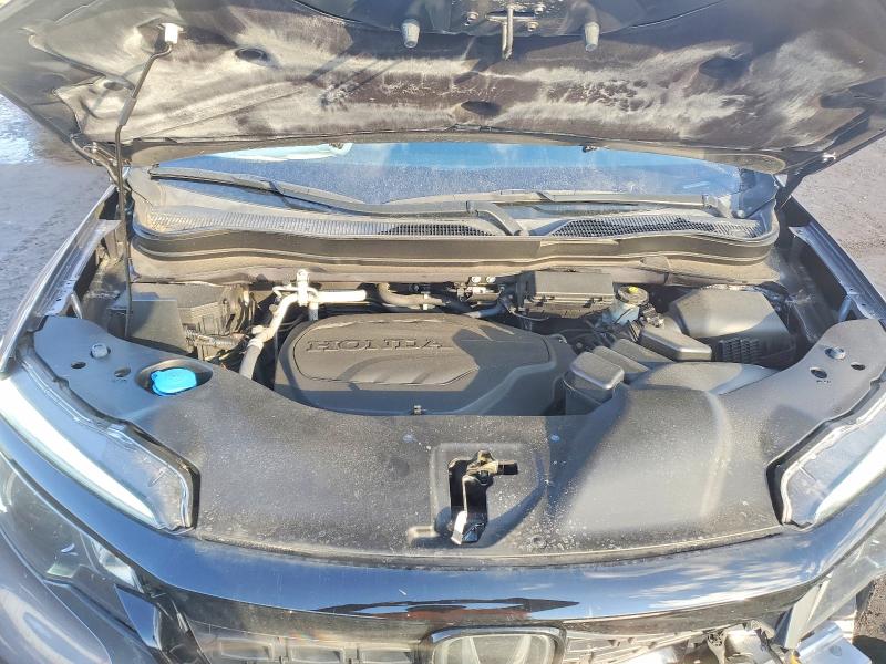 Photo 12 from auction – 2021 HONDA PASSPORT E with VIN 5FNYF8H57MB013917
