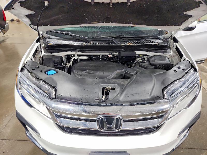 Photo 12 from auction – 2022 HONDA PILOT TOUR with VIN 5FNYF6H62NB098518