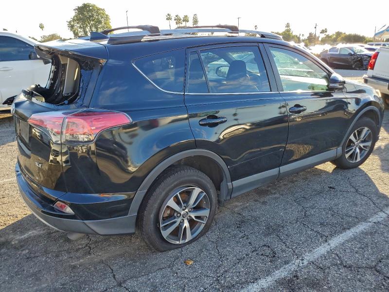 Photo 3 from auction – 2017 TOYOTA RAV4 XLE with VIN 2T3WFREV0HW376268