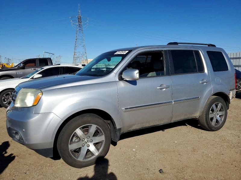 HONDA PILOT TOUR 2013 with VIN 5FNYF4H97DB020667 - Photo from auction