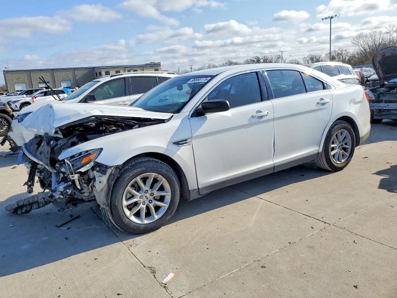 FORD TAURUS SE 2015 with VIN 1FAHP2D81FG124407 - Photo from auction