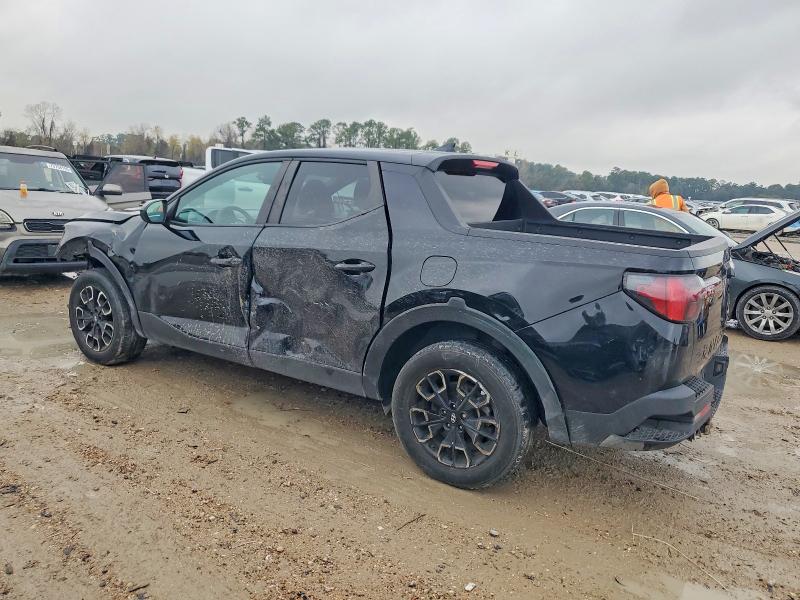Photo 2 from auction – 2023 HYUNDAI SANTA CRUZ with VIN 5NTJADAE2PH076191
