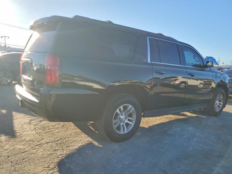 Photo 3 from auction – 2019 CHEVROLET SUBURBAN with VIN 1GNSCHKC0KR360994