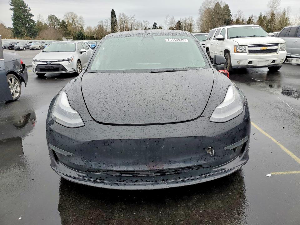 Photo 5 from auction – 2022 TESLA MODEL 3 with VIN 5YJ3E1ECXNF123515