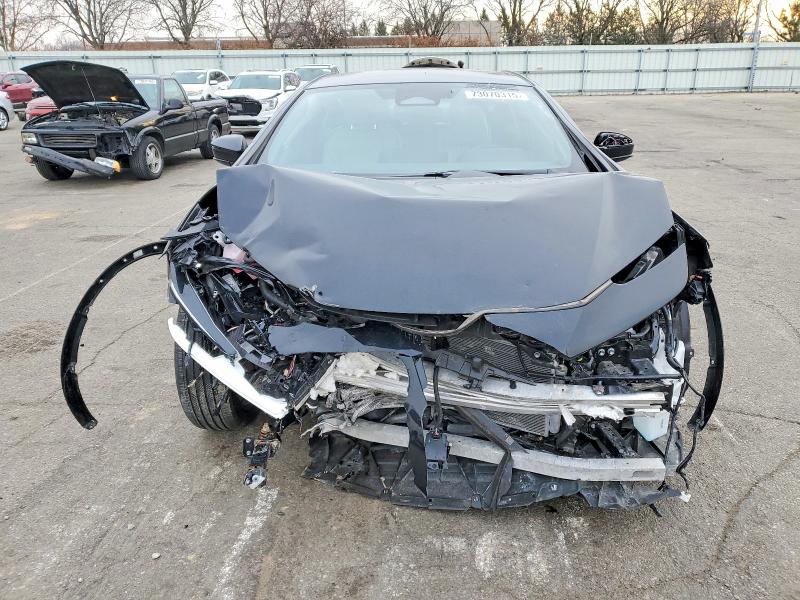 Photo 5 from auction – 2023 TOYOTA PRIUS LE with VIN JTDADABU2P3005840