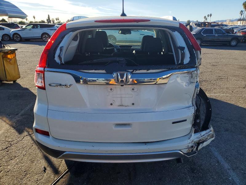 Photo 6 from auction – 2015 HONDA CR-V with VIN 5J6RM3H93FL024665
