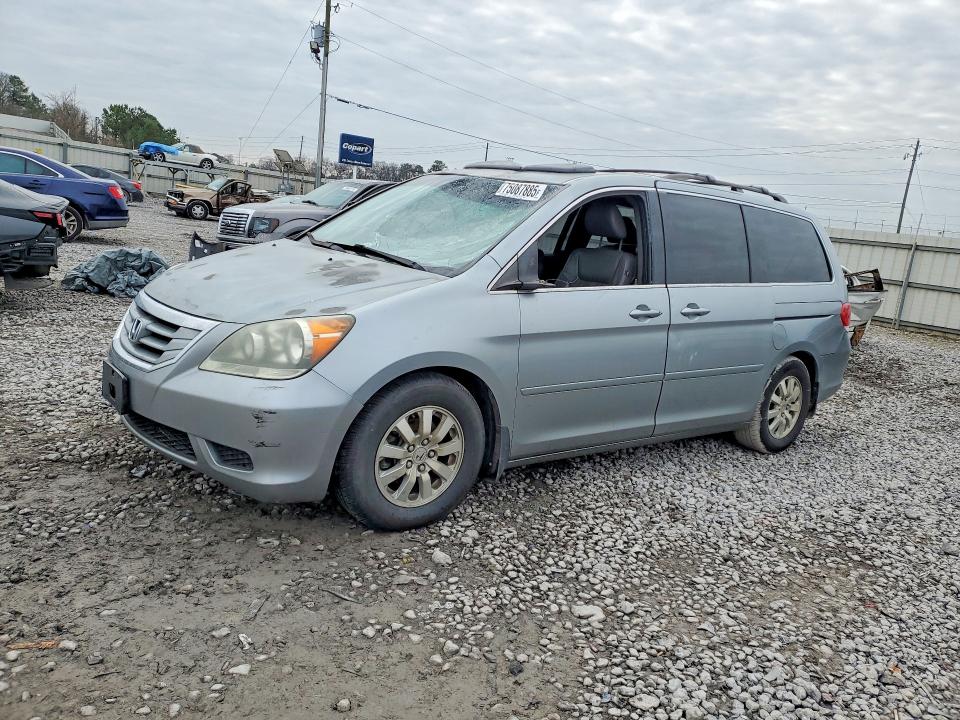 HONDA ODYSSEY EX 2010 with VIN 5FNRL3H74AB102342 - Photo from auction