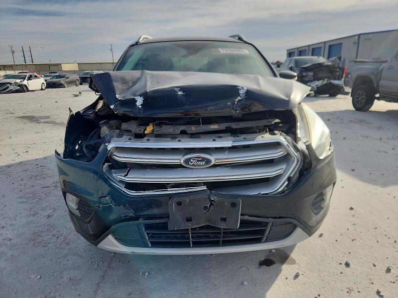 Photo 5 from auction – 2017 FORD ESCAPE with VIN 1FMCU0JD7HUD10570