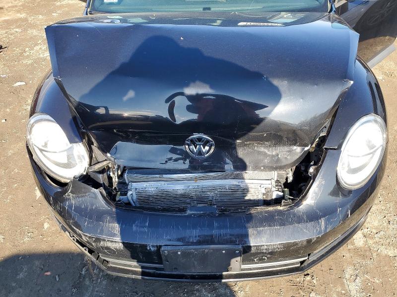 Photo 11 from auction – 2015 VOLKSWAGEN BEETLE with VIN 3VWF17ATXFM651051