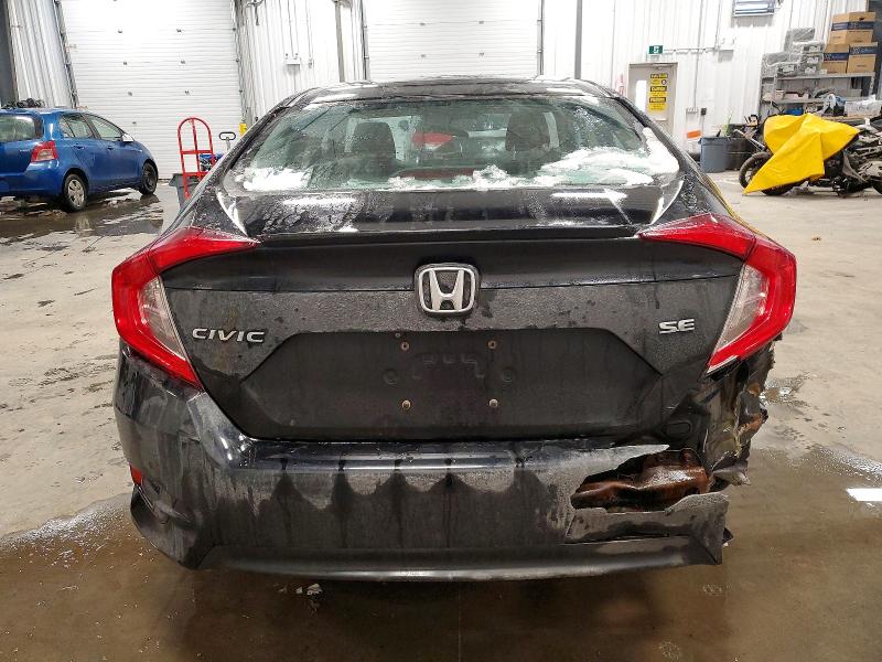 Photo 6 from auction – 2018 HONDA CIVIC LX with VIN 2HGFC2F68JH022304