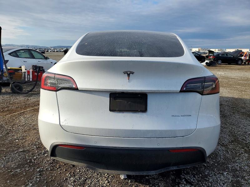Photo 6 from auction – 2021 TESLA MODEL Y with VIN 5YJYGAEE0MF273200