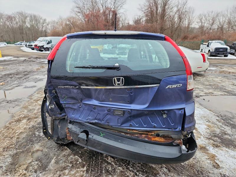 Photo 6 from auction – 2014 HONDA CR-V LX with VIN 2HKRM4H36EH611078