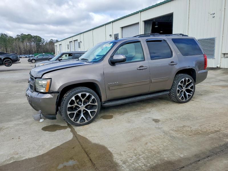 CHEVROLET TAHOE 2011 with VIN 1GNSKBE05BR211532 - Photo from auction