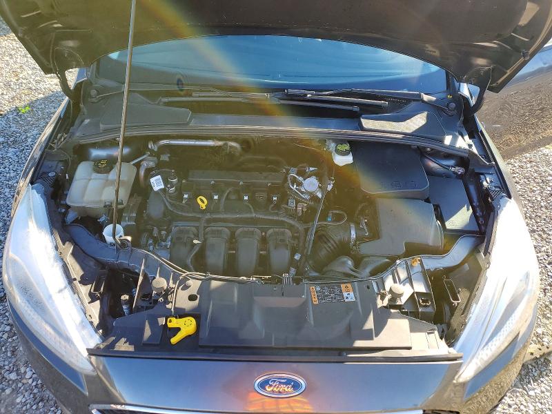 Photo 11 from auction – 2018 FORD FOCUS with VIN 1FADP3F23JL307546