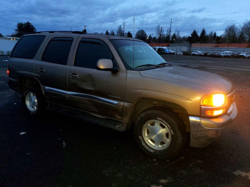 Photo 4 from auction – 2004 GMC YUKON with VIN 1GKEC13V24J145345