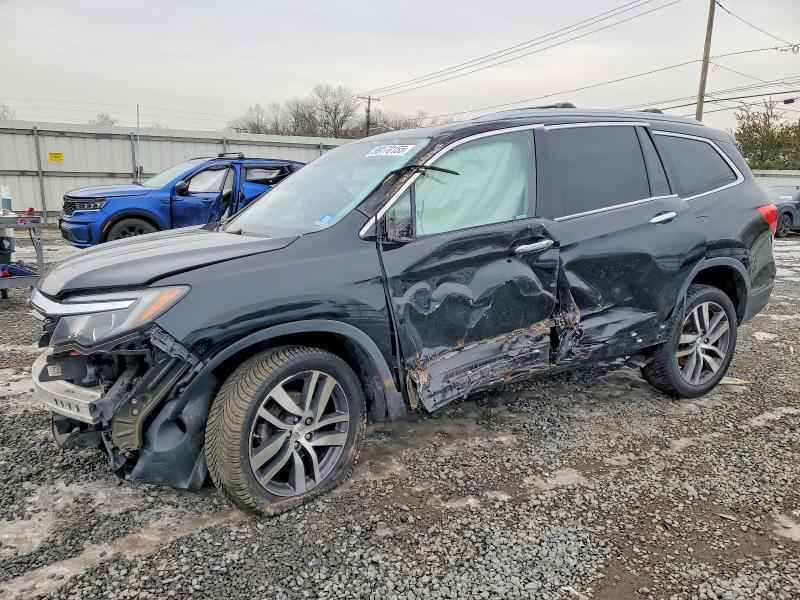 Photo 1 from auction – 2018 HONDA PILOT TOUR with VIN 5FNYF6H93JB051342