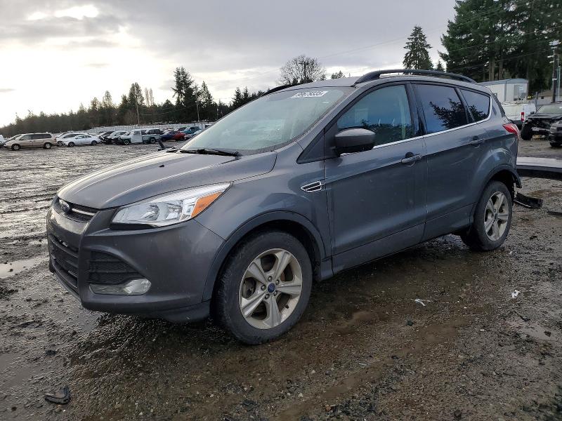 FORD ESCAPE SE 2014 with VIN 1FMCU9G9XEUD03311 - Photo from auction
