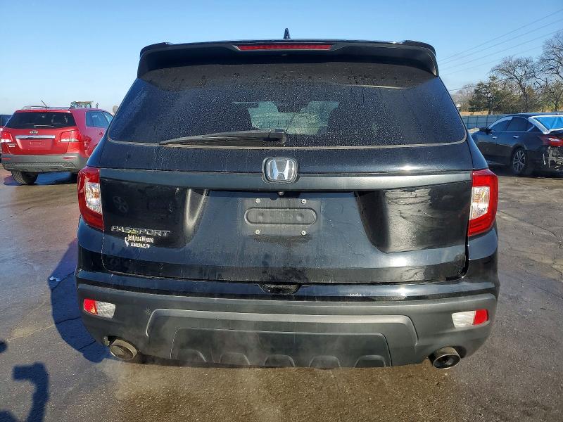 Photo 6 from auction – 2021 HONDA PASSPORT E with VIN 5FNYF7H59MB009765