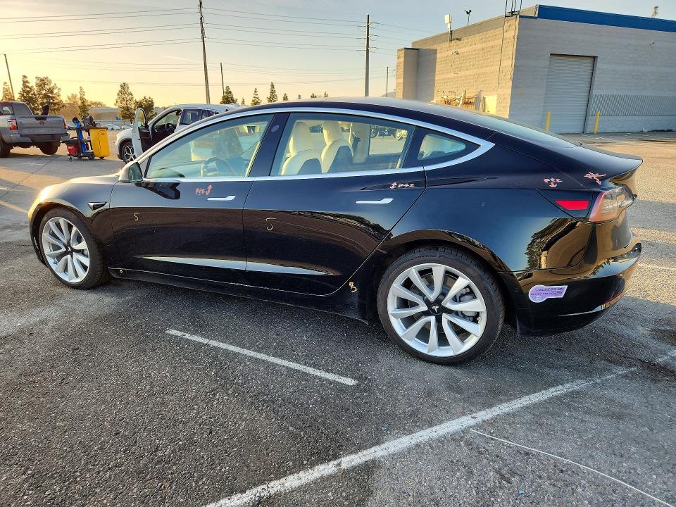 Photo 2 from auction – 2018 TESLA MODEL 3 with VIN 5YJ3E1EB2JF147888