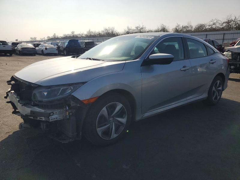 HONDA CIVIC LX 2019 with VIN 19XFC2F6XKE032425 - Photo from auction