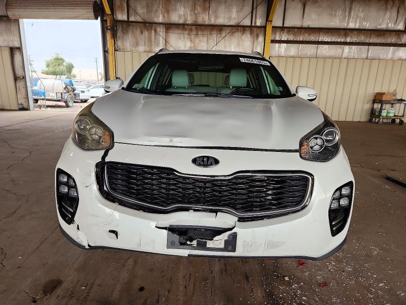 Photo 5 from auction – 2018 KIA SPORTAGE E with VIN KNDPNCAC5J7425667