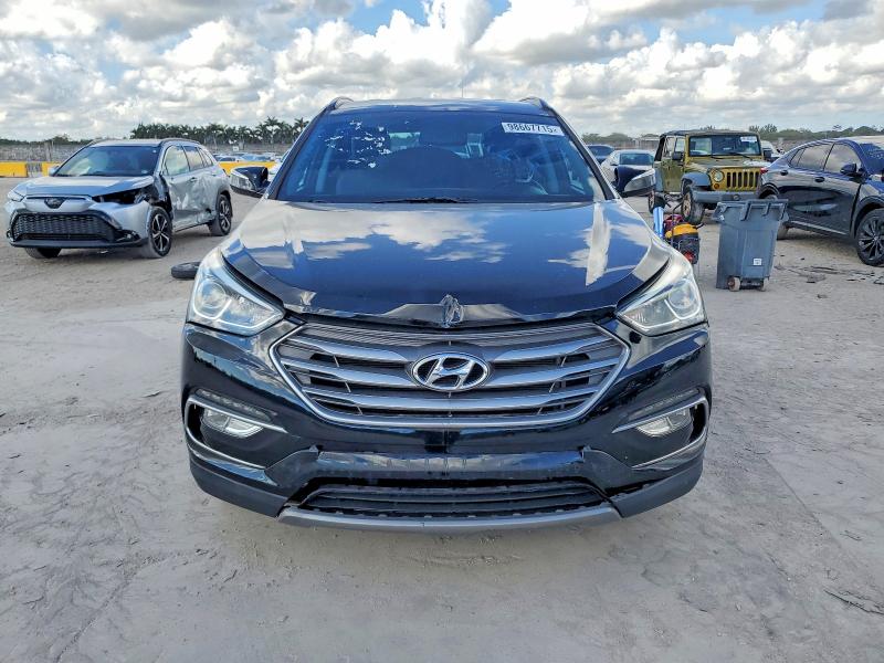 Photo 5 from auction – 2017 HYUNDAI SANTA FE S with VIN 5NMZU3LB5HH014725