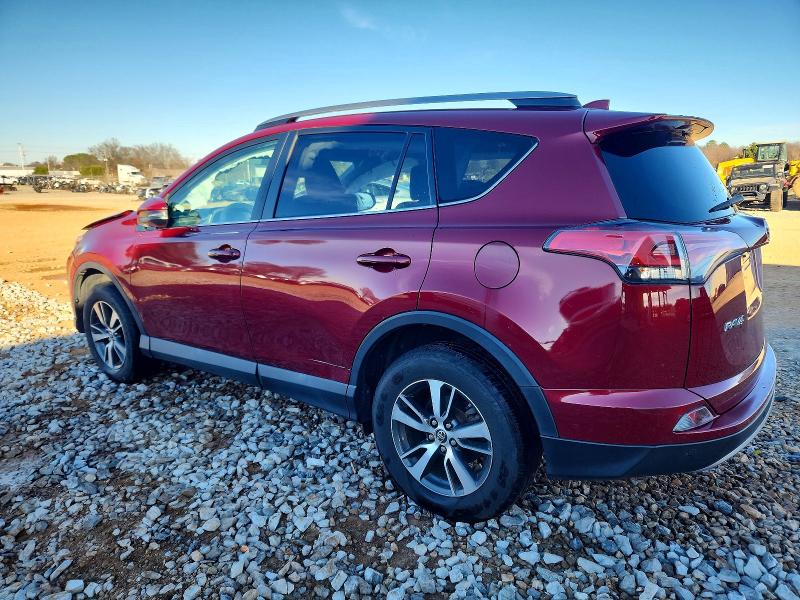 Photo 2 from auction – 2018 TOYOTA RAV4 with VIN 2T3WFREV9JW424940