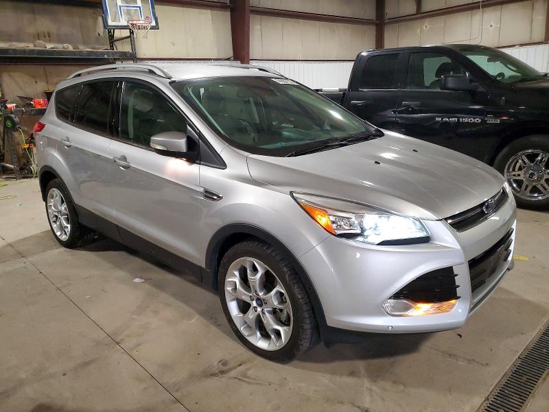Photo 4 from auction – 2016 FORD ESCAPE TIT with VIN 1FMCU9J95GUA63581