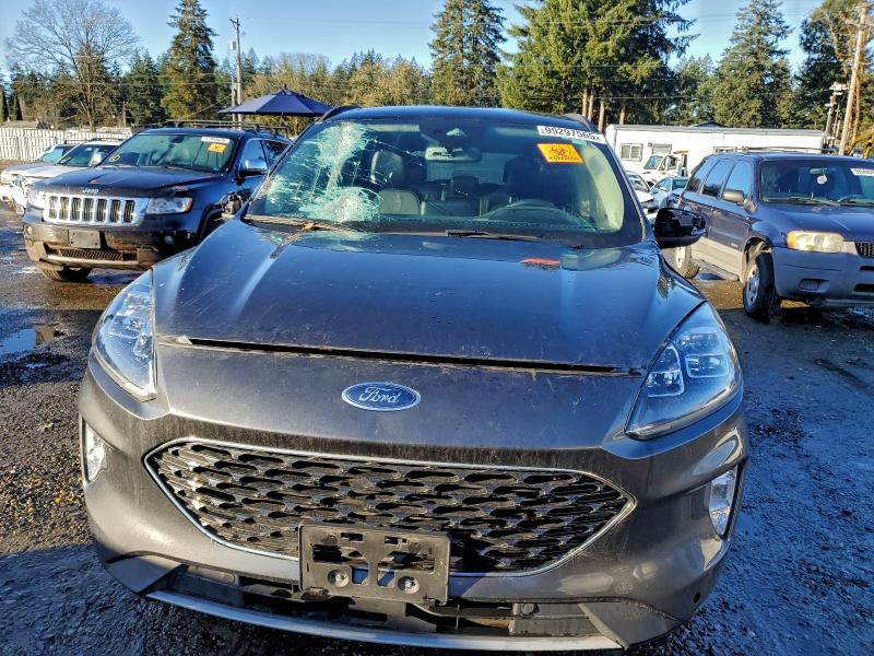 Photo 5 from auction – 2020 FORD ESCAPE TIT with VIN 1FMCU9DZ3LUC56771