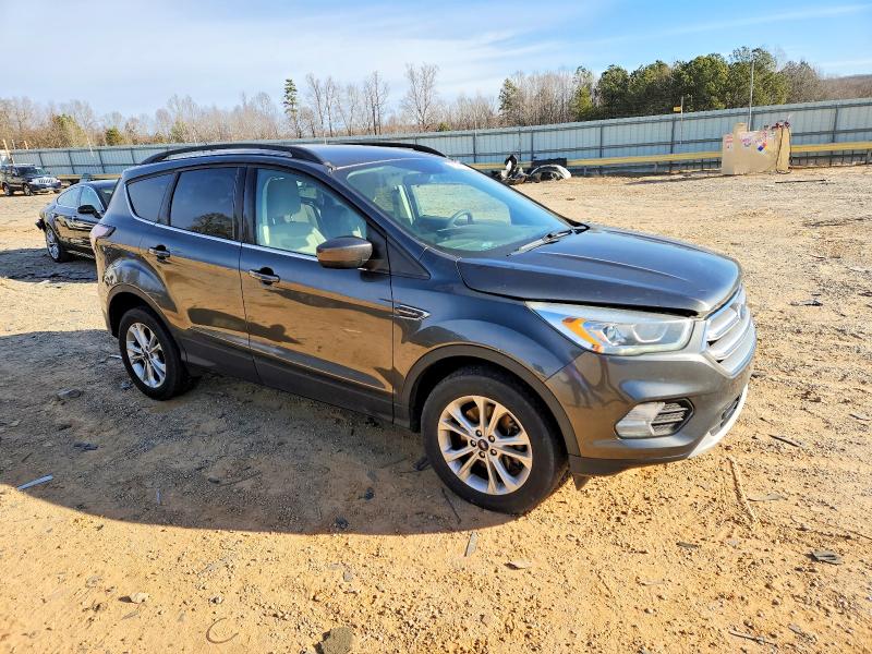 Photo 4 from auction – 2017 FORD ESCAPE SE with VIN 1FMCU9GD8HUB90175