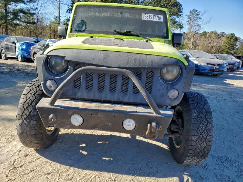 Photo 5 from auction – 2016 JEEP WRANGLER U with VIN 1C4BJWDG2GL304732