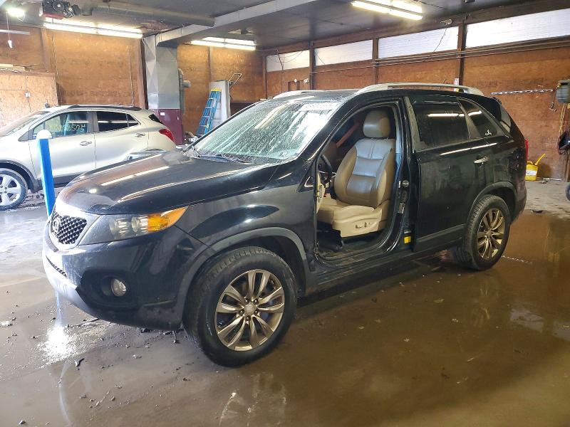 KIA SORENTO EX 2011 with VIN 5XYKUDA28BG059475 - Photo from auction