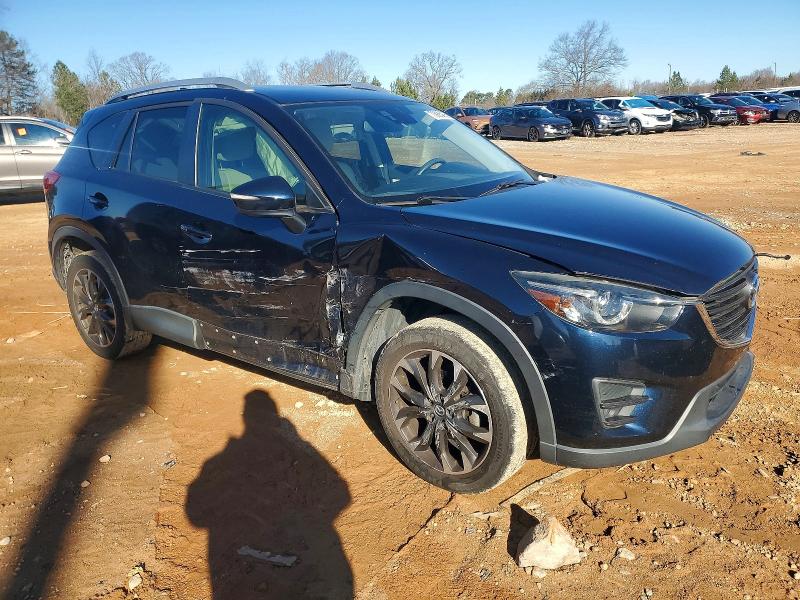 Photo 4 from auction – 2016 MAZDA CX-5 with VIN JM3KE2DY8G0874412