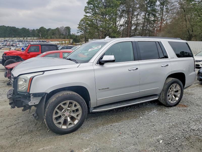 GMC YUKON SLE 2016 with VIN 1GKS1AKC5GR170058 - Photo from auction