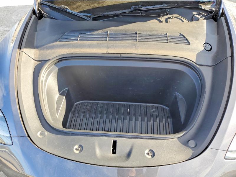 Photo 11 from auction – 2023 TESLA MODEL Y with VIN 7SAYGDED8PF977063