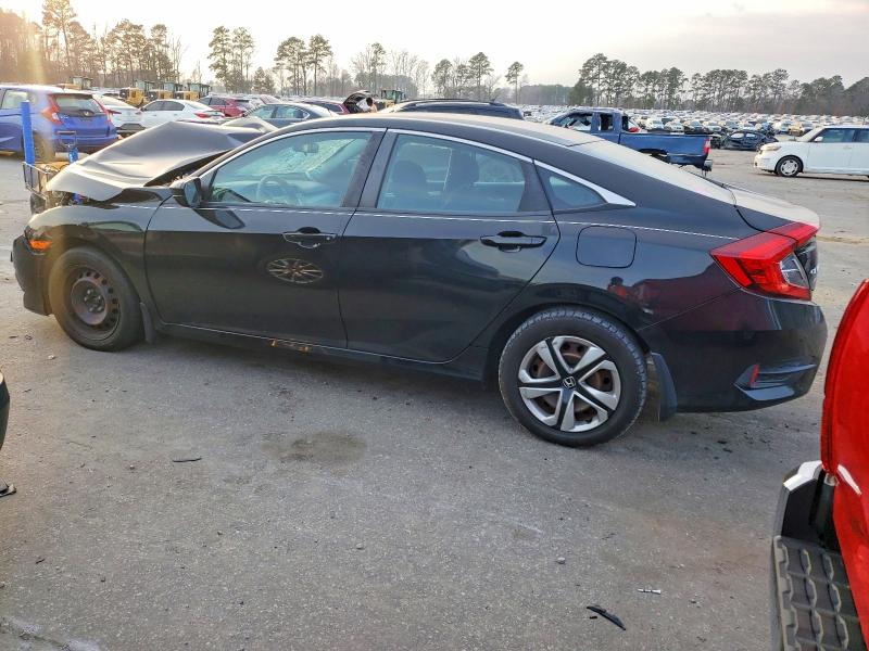 Photo 2 from auction – 2016 HONDA CIVIC with VIN 19XFC2F51GE061102