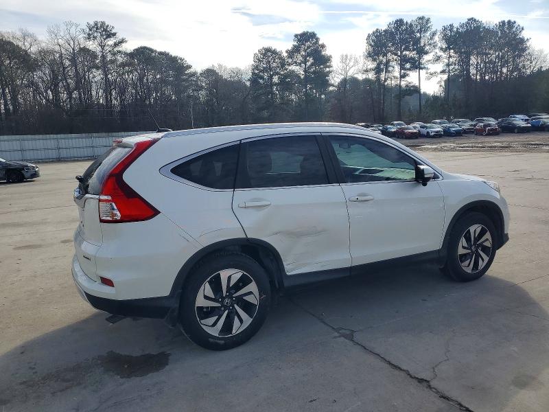 Photo 3 from auction – 2016 HONDA CR-V TOURI with VIN 5J6RM3H90GL019053